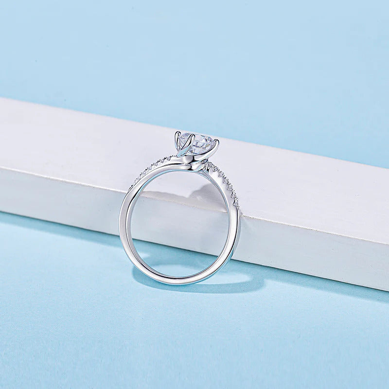 Round Cut Moissanite Twist Ring