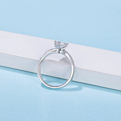 Round Cut Moissanite Twist Ring